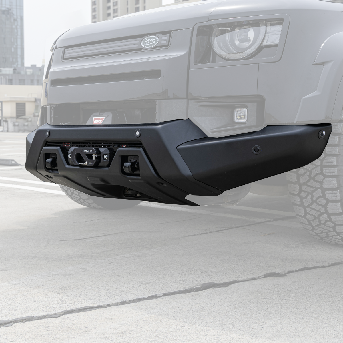Off road Defender front bumper installed side view aggressive exterior upgrade
