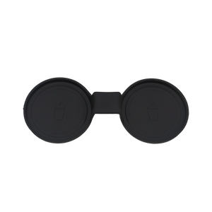 An image showing the interior of the INEOS Grenadier center console with a custom-moulded black silicone Anti-Slip Cup Holder Mat installed in the twin slots. The mat clearly shows the raised edges for spill containment and subtle drink icons.