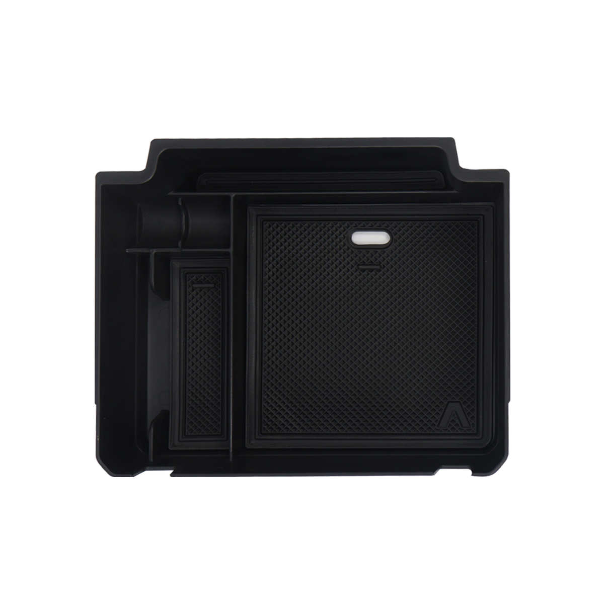 plomor-An image showing the interior of the INEOS Grenadier cab, featuring a custom-fit, black matte ABS storage tray installed on top of the center dashboard. The tray is visible holding small items and shows the built-in cable pass-through slot.