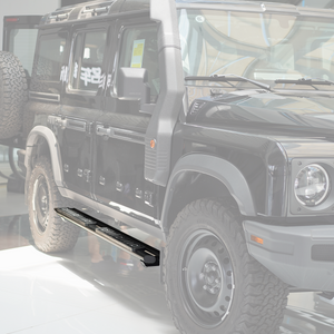 plomor-Dual-An image showing the Dual-Tube Fixed Side Steps installed on the side of an INEOS Grenadier. The steps are made from black powder-coated aluminium alloy and clearly show the double-bar structure and integrated anti-slip step pads.