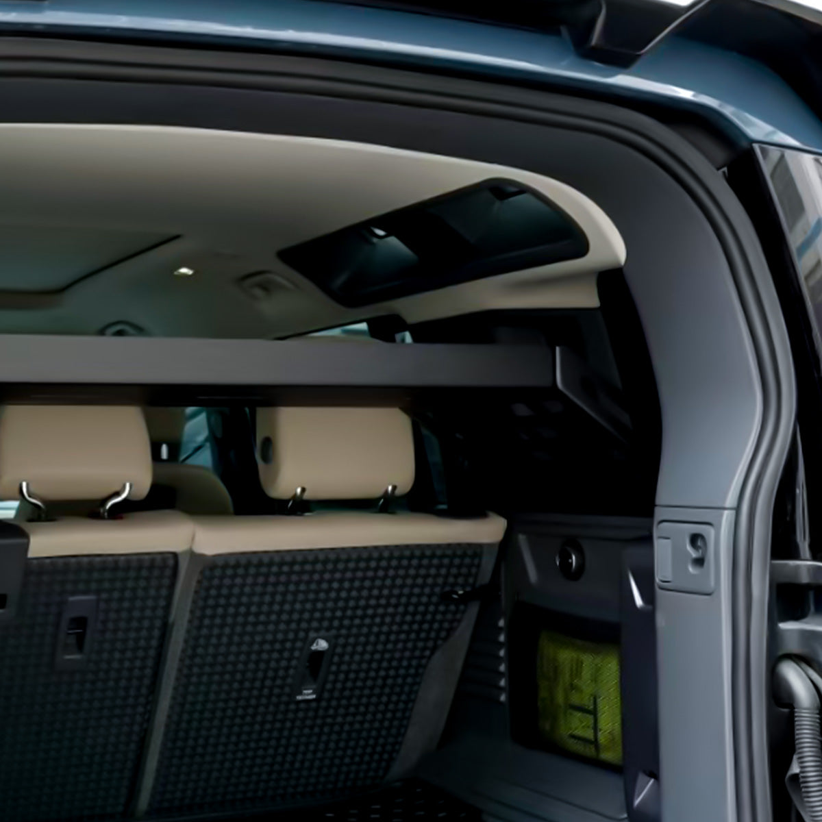 PLOMOR Defender 110 Rear Cargo Rack Loaded With Gear