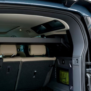 PLOMOR Defender 110 Rear Cargo Rack Loaded With Gear