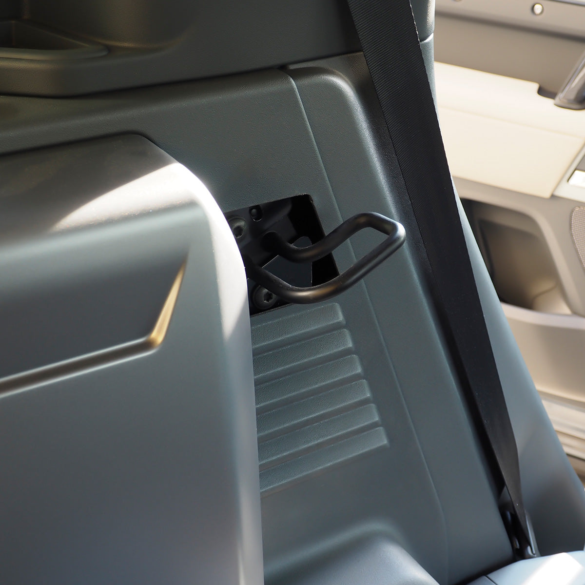 PLOMOR Rear Seat Recline Hook Installed Back View on Defender 110
