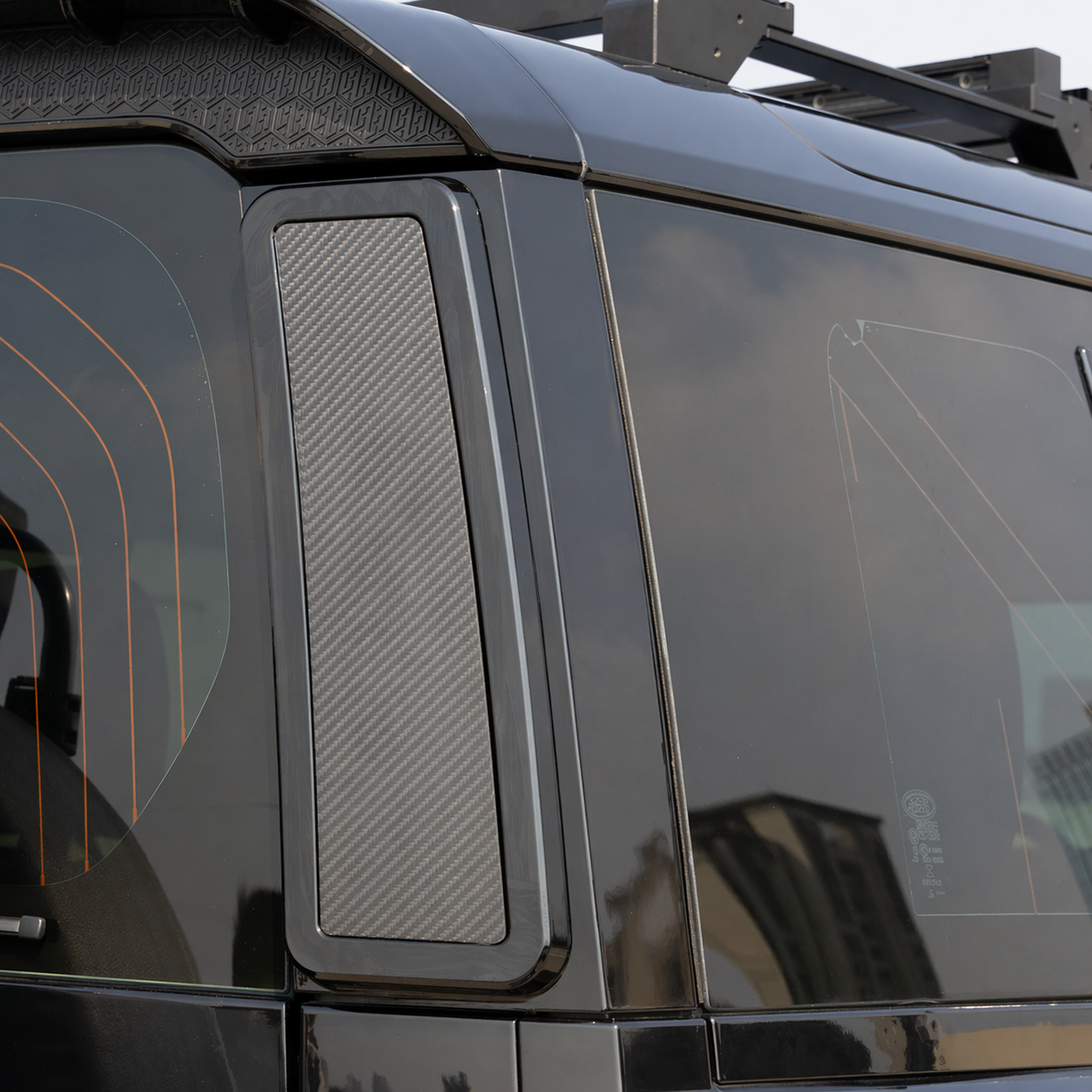 OEM fit look of PLOMOR rear storage box on Land Rover Defender 110