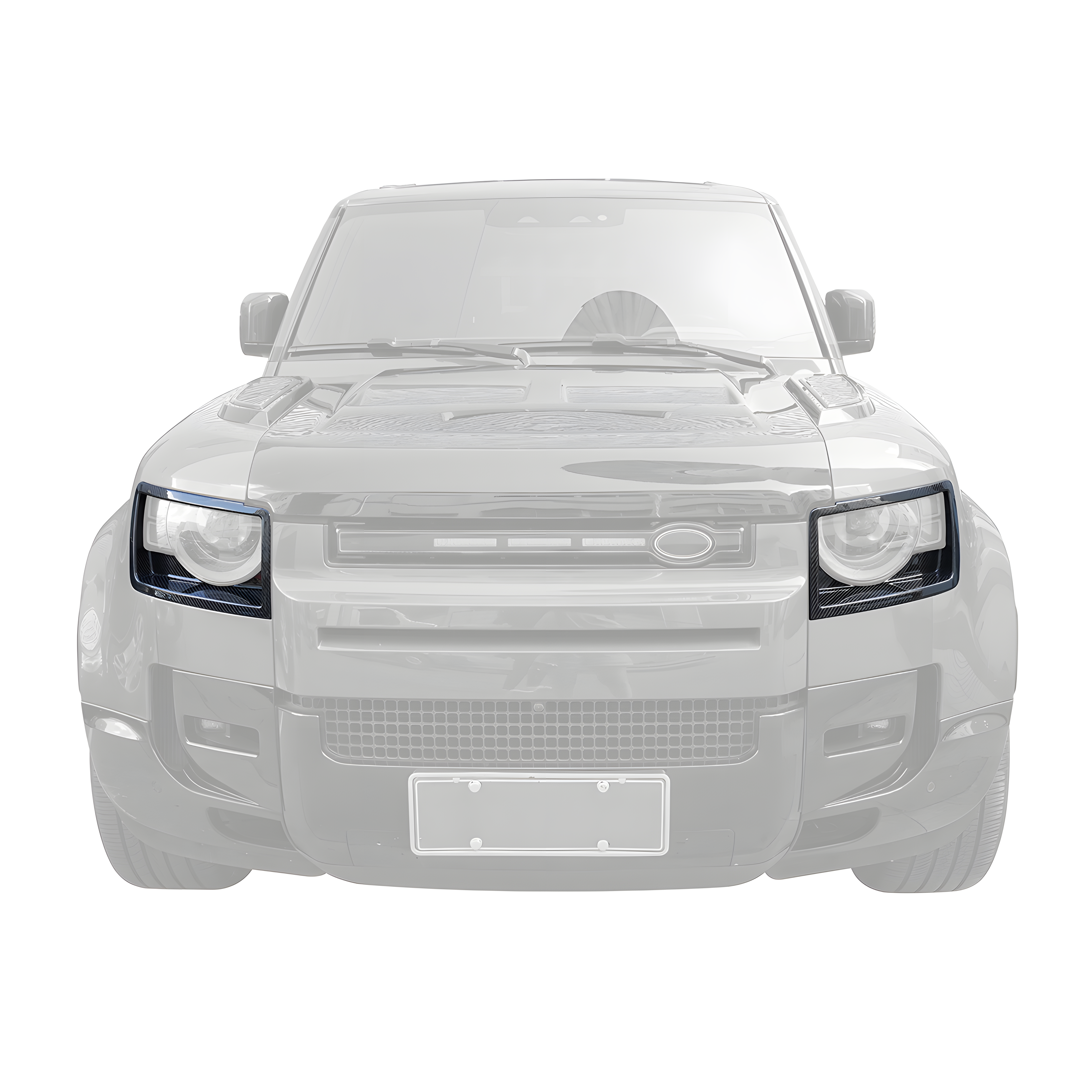 Front view of PLOMOR dry carbon headlight covers installed on Land Rover Defender 90/110/130