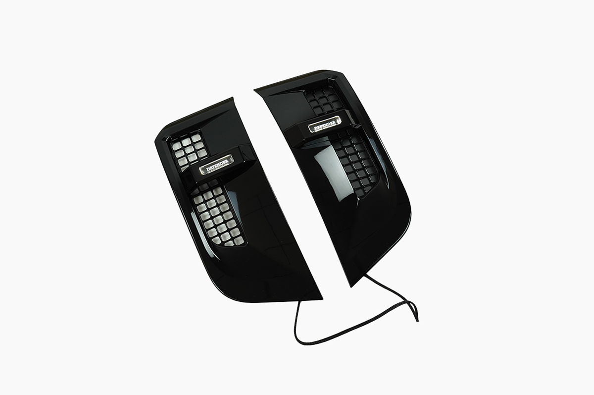 Modern OEM design. - PLOMOR Land Rover Defender 90/110 LED Side Vents | Gloss Black | Plug-and-Play