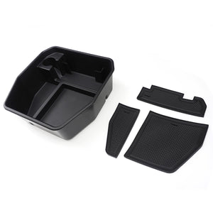 PLOMOR custom-fit armrest storage box for Defender 90/110 L663