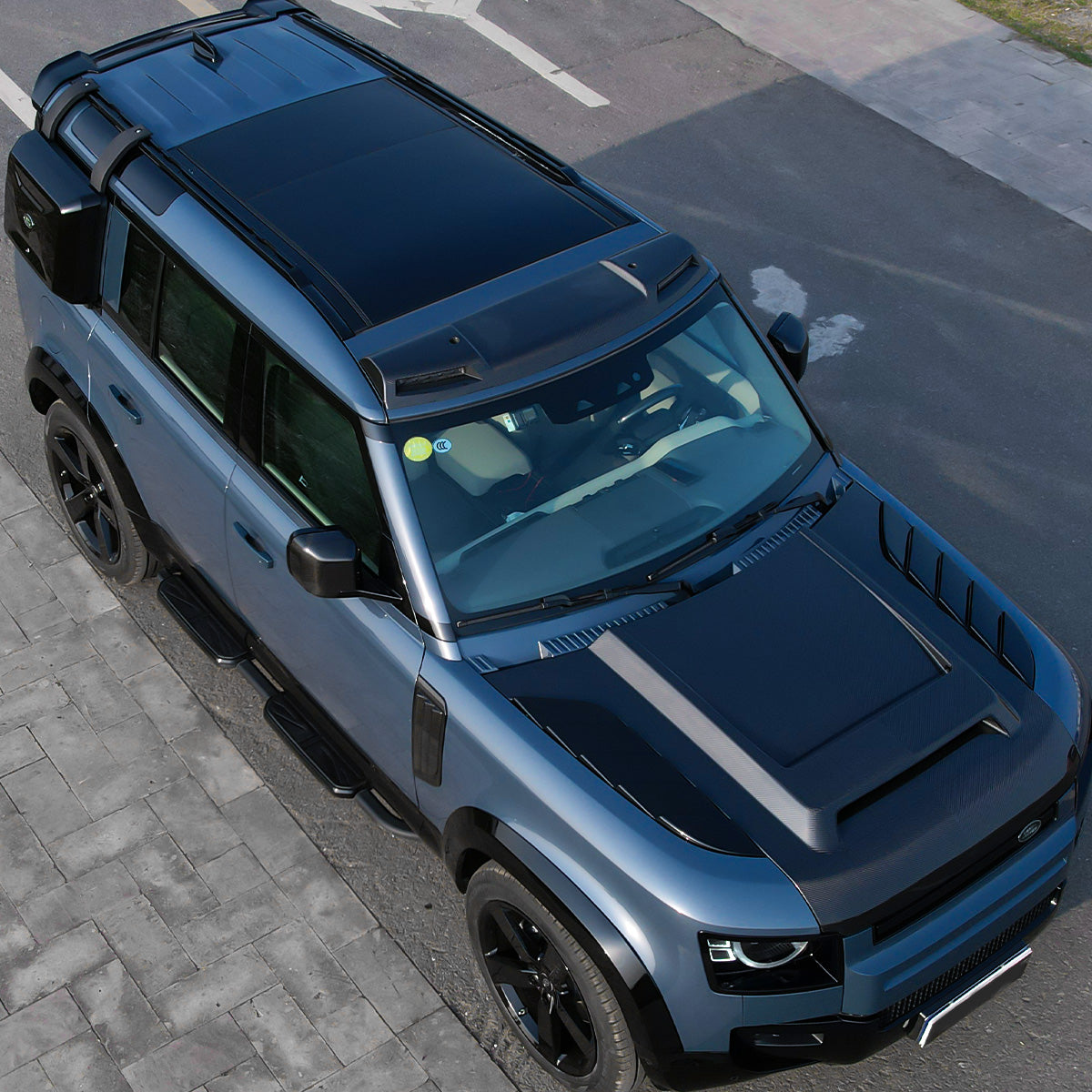 PLOMOR Defender 90/110 Roof Rack with Cargo Boxes Installed