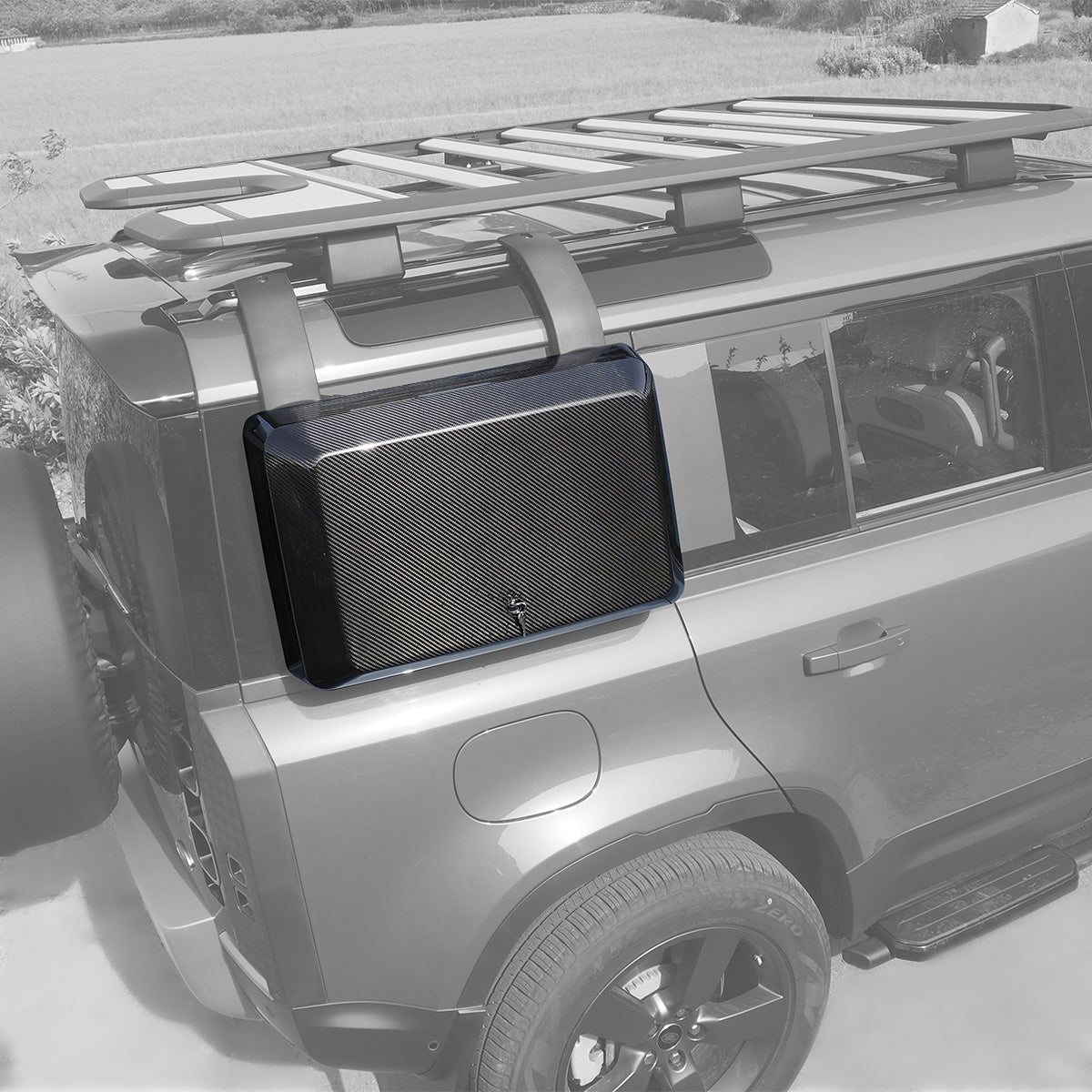 PLOMOR carbon fibre side storage box installed on Land Rover Defender 90