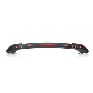 Close-up gloss black ABS aerodynamic spoiler wing detail