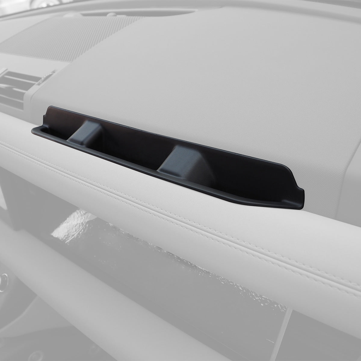 PLOMOR grab handle storage box installed driver side interior view