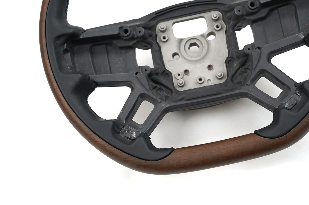 Retains OEM airbag and steering controls           - PLOMOR Walnut & Nappa Performance Steering Wheel for Land Rover Defender 90/110/130
