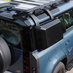 PLOMOR carbon fibre side storage box installed on Defender for off-road use