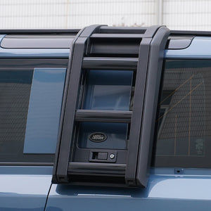Defender with PLOMOR Side Ladder used for roof rack access