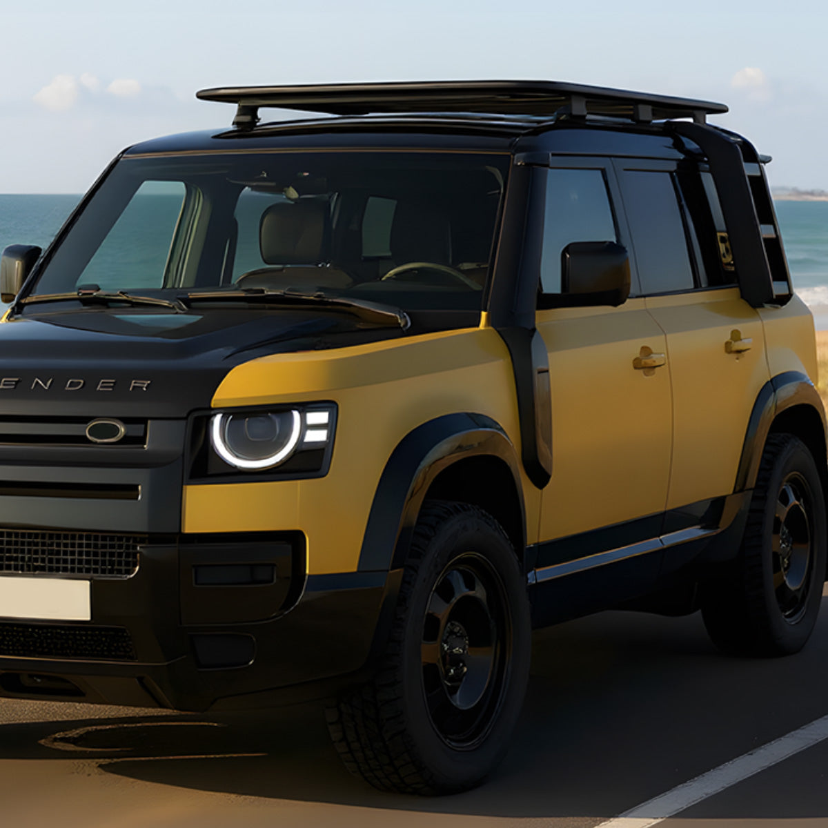 Clean OEM-style installation of PLOMOR snorkel kit with A-pillar covers on Defender