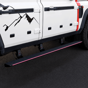 PLOMOR electric side steps installed on INEOS Grenadier 2023–2025 side view OEM+ LED running boards