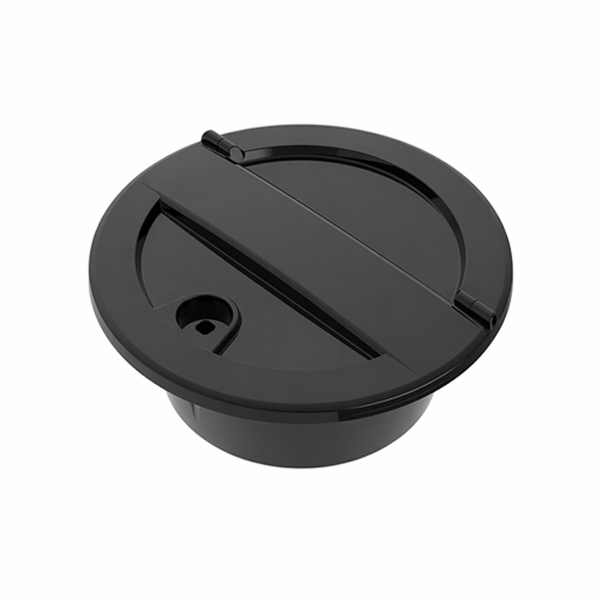Open spare wheel storage box for Ineos Grenadier showing internal compartment for tools and gear