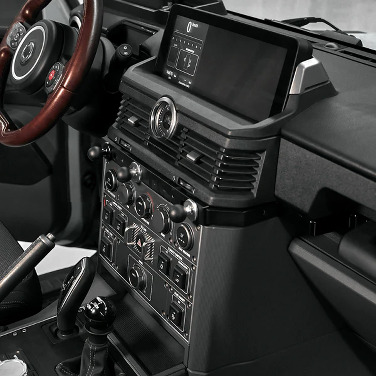 “Plomor premium aluminium centre console track installed in an INEOS Grenadier, keeping accessories organised and within easy reach.”