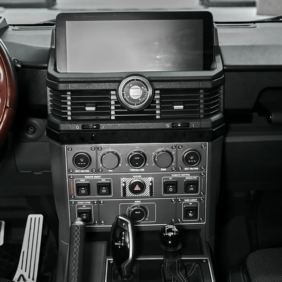 “Plomor aluminium centre console track installed in an INEOS Grenadier, modular mounting system for phones, radios and accessories.”