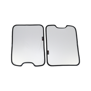 PLOMOR two-piece skylight roof sunshade for INEOS Grenadier, silver reflective side facing up, vertical layout with left panel bottom notch and right panel top notch