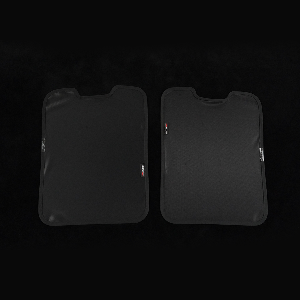 Pair of black skylight sunshades for the Ineos Grenadier (2020–2024), left and right panels with top notches, shown on a black background.