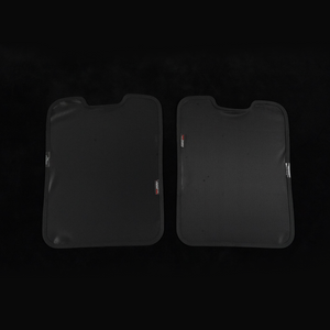 Pair of black skylight sunshades for the Ineos Grenadier (2020–2024), left and right panels with top notches, shown on a black background.