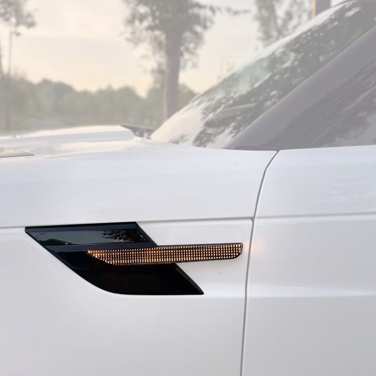 Night view of Range Rover Sport L461 LED side vent trim installed