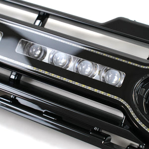 Detailed close-up of PLOMOR LED grille for Defender 90/110/130