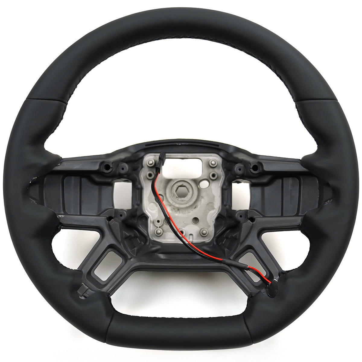 PLOMOR Nappa leather steering wheel grip close up detail