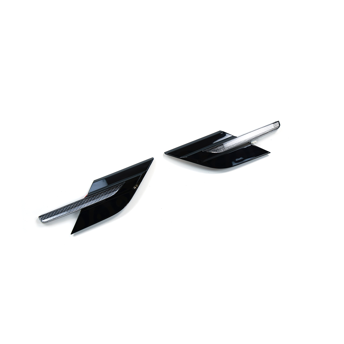 Pair of Range Rover fender side indicator/turn-signal trims in gloss black with clear lens, separated and angled on a white background.