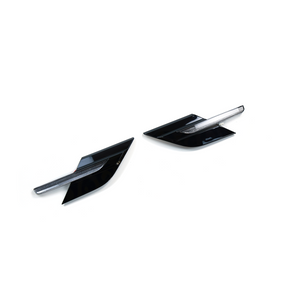 Pair of Range Rover fender side indicator/turn-signal trims in gloss black with clear lens, separated and angled on a white background.