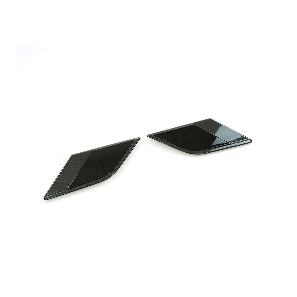 Pair of Range Rover fender side vent trim covers with carbon-fiber look surround and gloss-black insert, separated and angled on a white background.