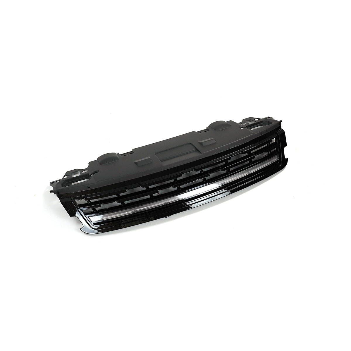 Angled studio photo of a Range Rover front grille assembly in gloss black on a white background, LED strip unlit.