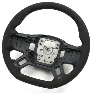 PLOMOR steering wheel stitching detail premium finish close up
