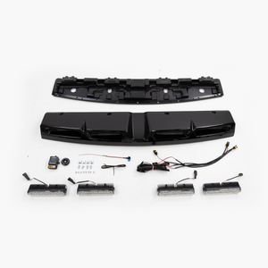 PLOMOR four-lamp roof lighting cover for Toyota LC250 in gloss black, kit laydown with mounting hardware (drill-free)