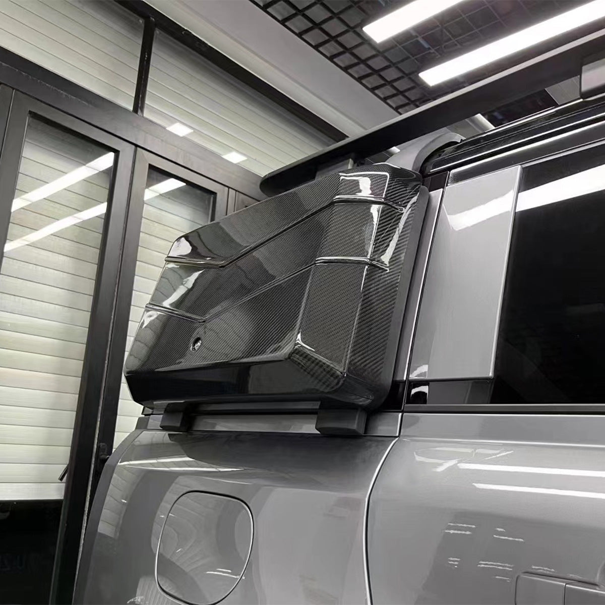 PLOMOR V-Shaped Carbon Fibre Side Backpack Installed Showing Lockable Feature