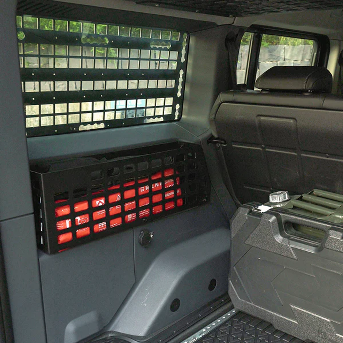 plomor rear cargo MOLLE panel installed in INEOS Grenadier trunk side area