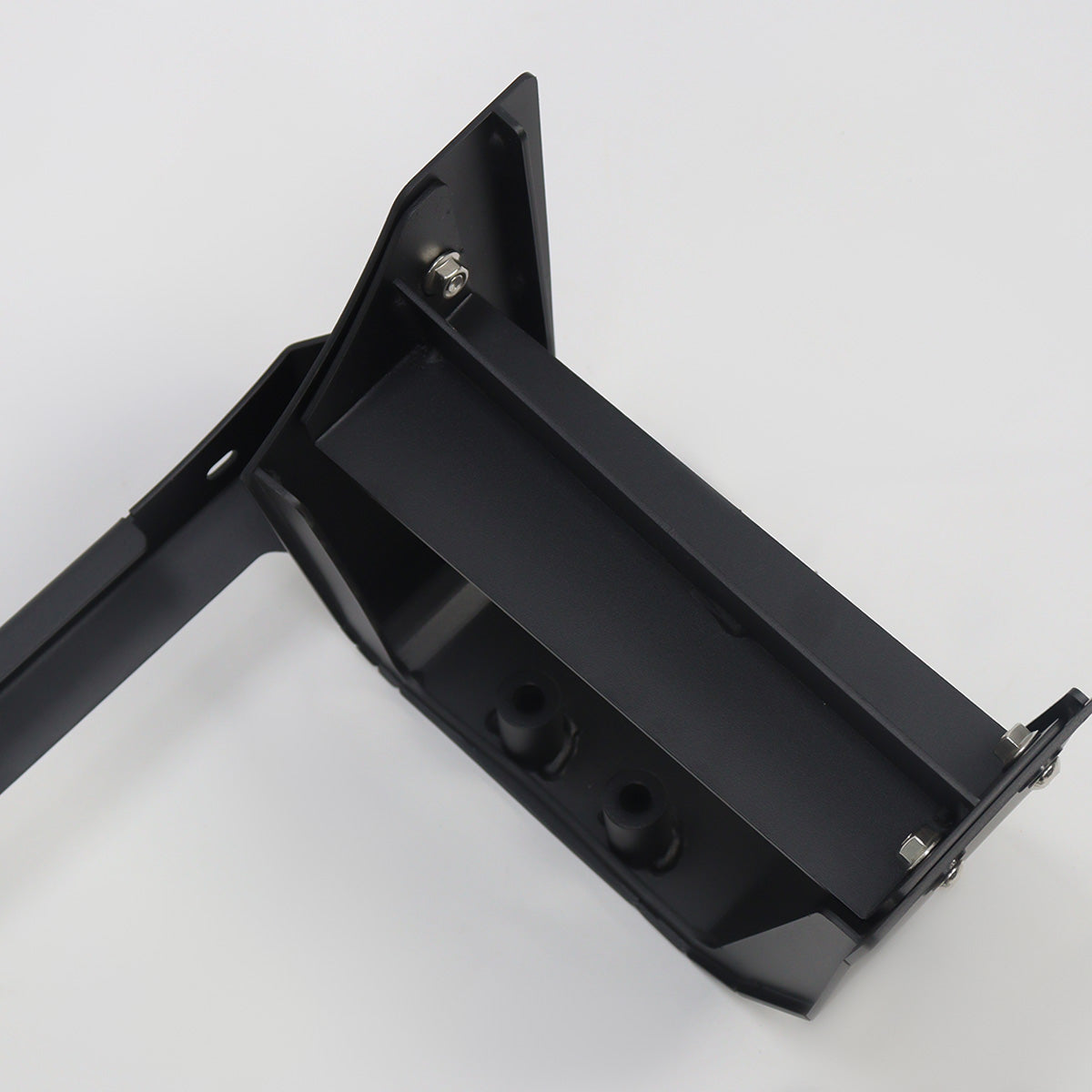 PLOMOR aluminium and steel front bumper light mount bracket for Ineos Grenadier. Gloss black finish, custom-fit for two spotlights or one LED light bar.