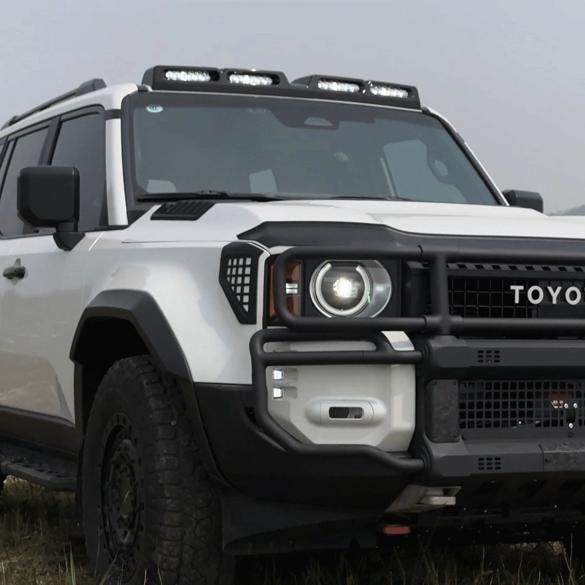 Toyota LC250 low profile four lamp roof light cover designed to reduce wind noise